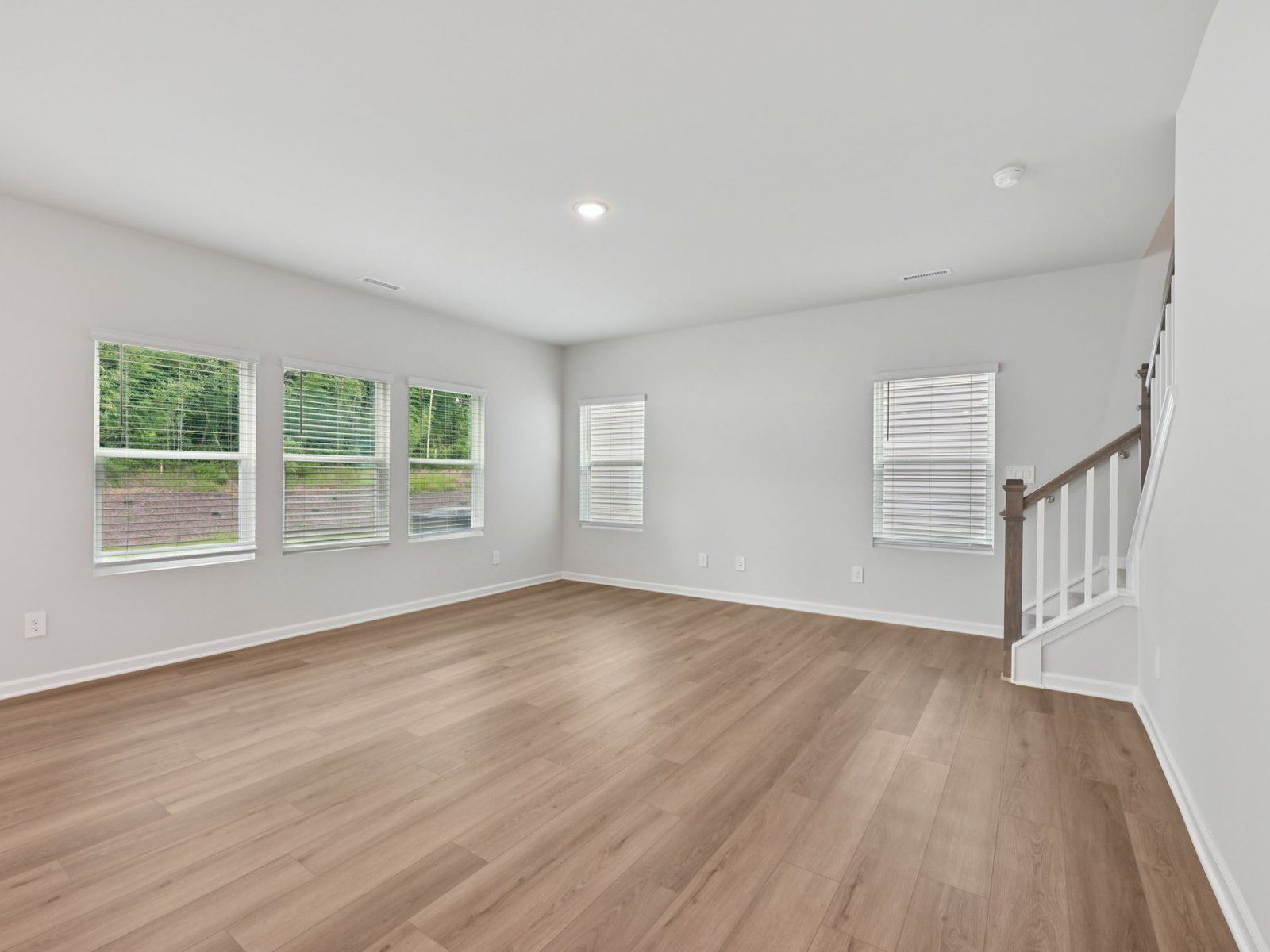 Great room in the Brentwood floorplan at a Meritage Homes community in Garner, NC.