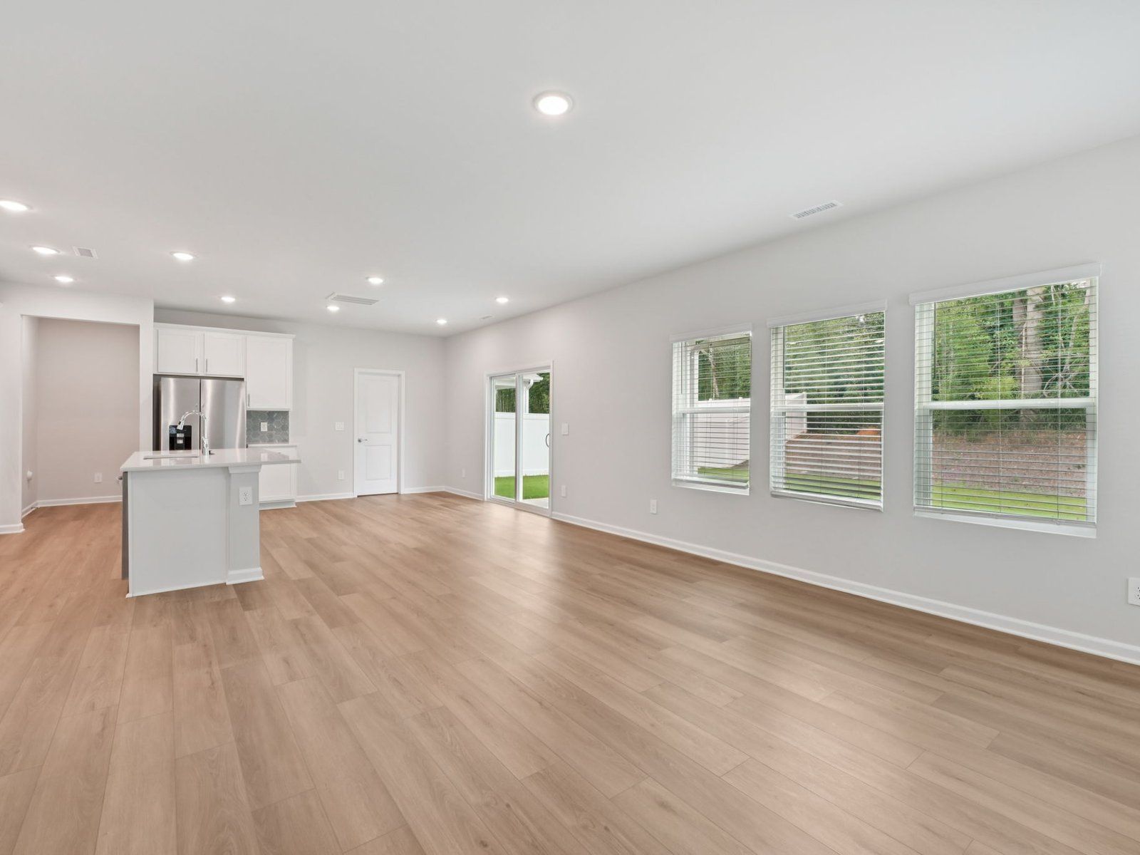 Great room in the Brentwood floorplan at a Meritage Homes community in Garner, NC.