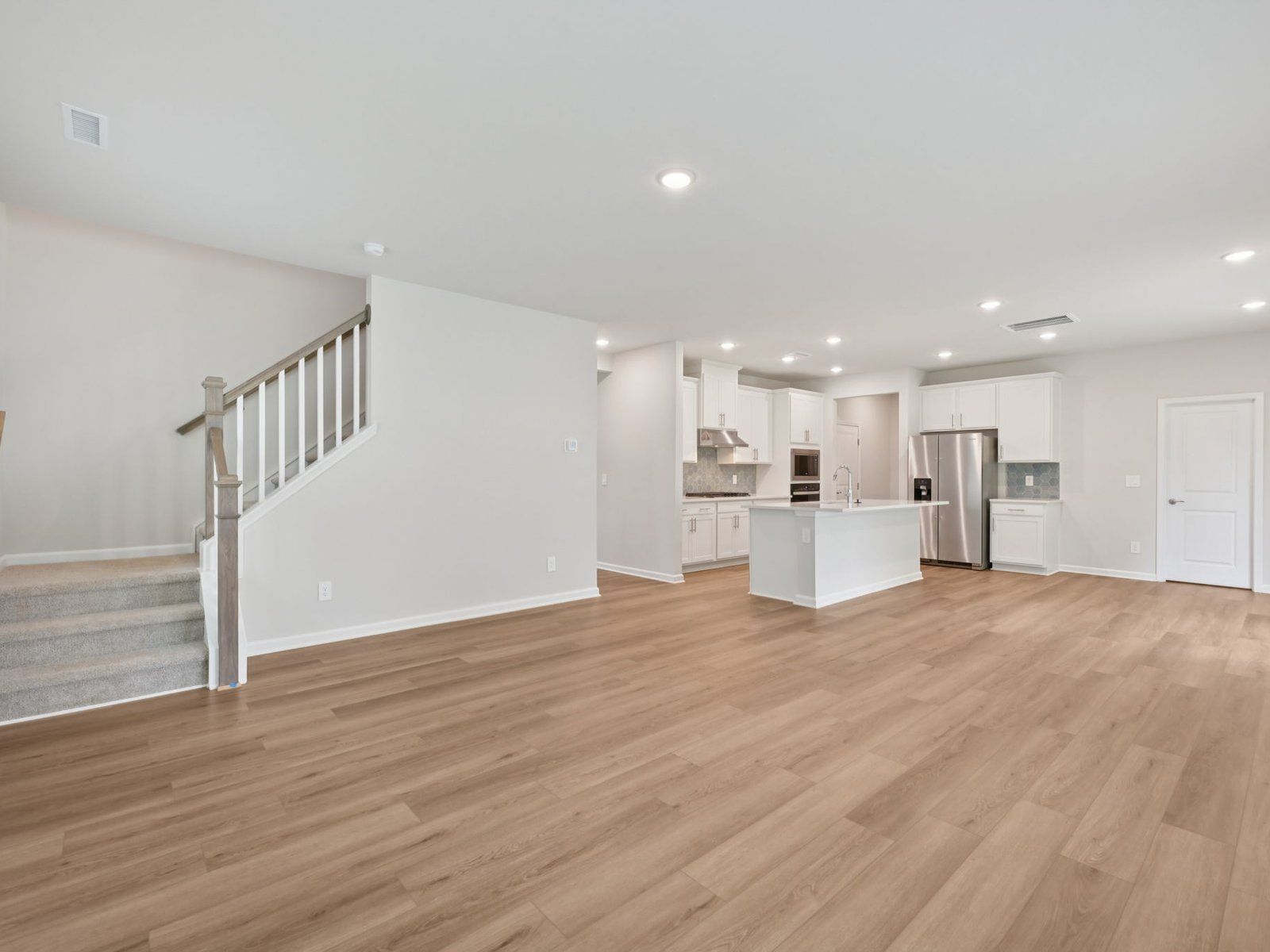 Great room in the Brentwood floorplan at a Meritage Homes community in Garner, NC.