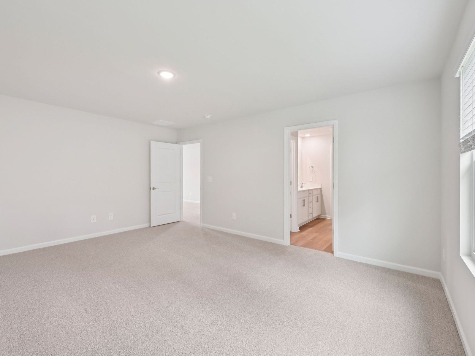 Primary bedroom in the Brentwood floorplan at a Meritage Homes community in Garner, NC.