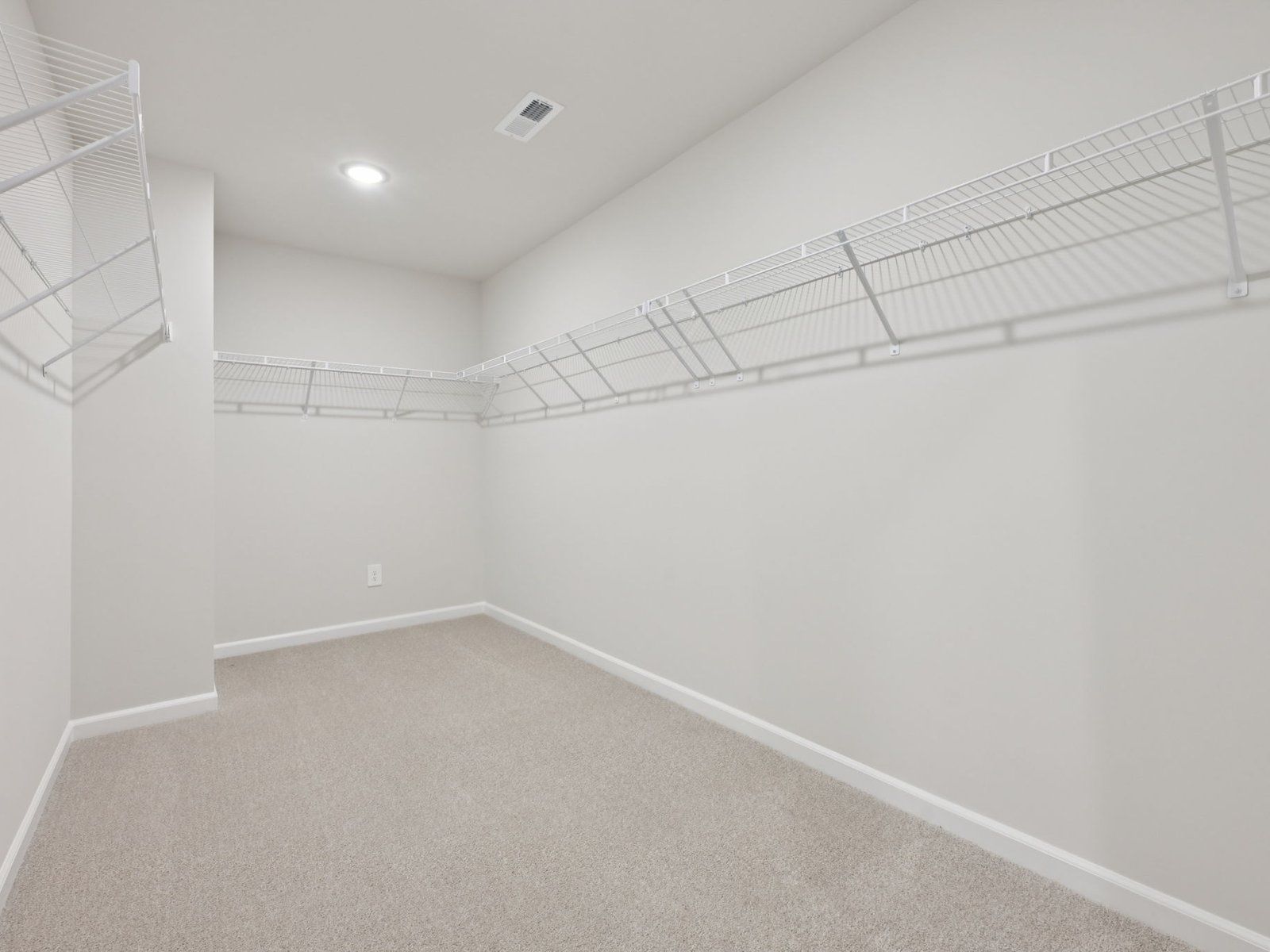 Walk-in closet in the Brentwood floorplan at a Meritage Homes community in Garner, NC.