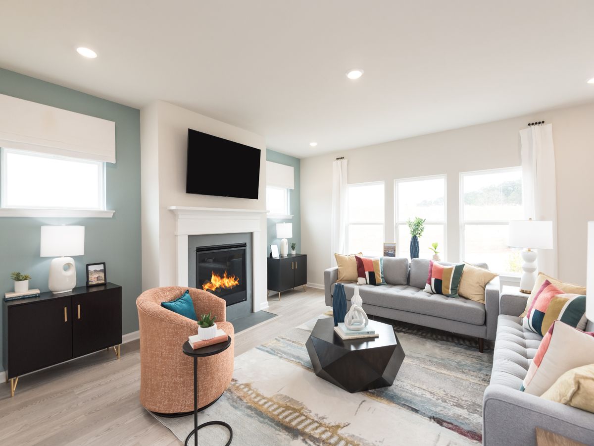 Relax by the fireplace and enjoy a movie night in the great room.
