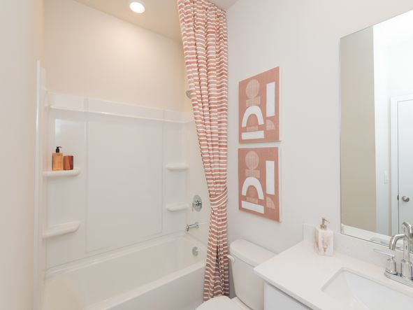Host guests comfortable with a complementary bathroom on the main level.