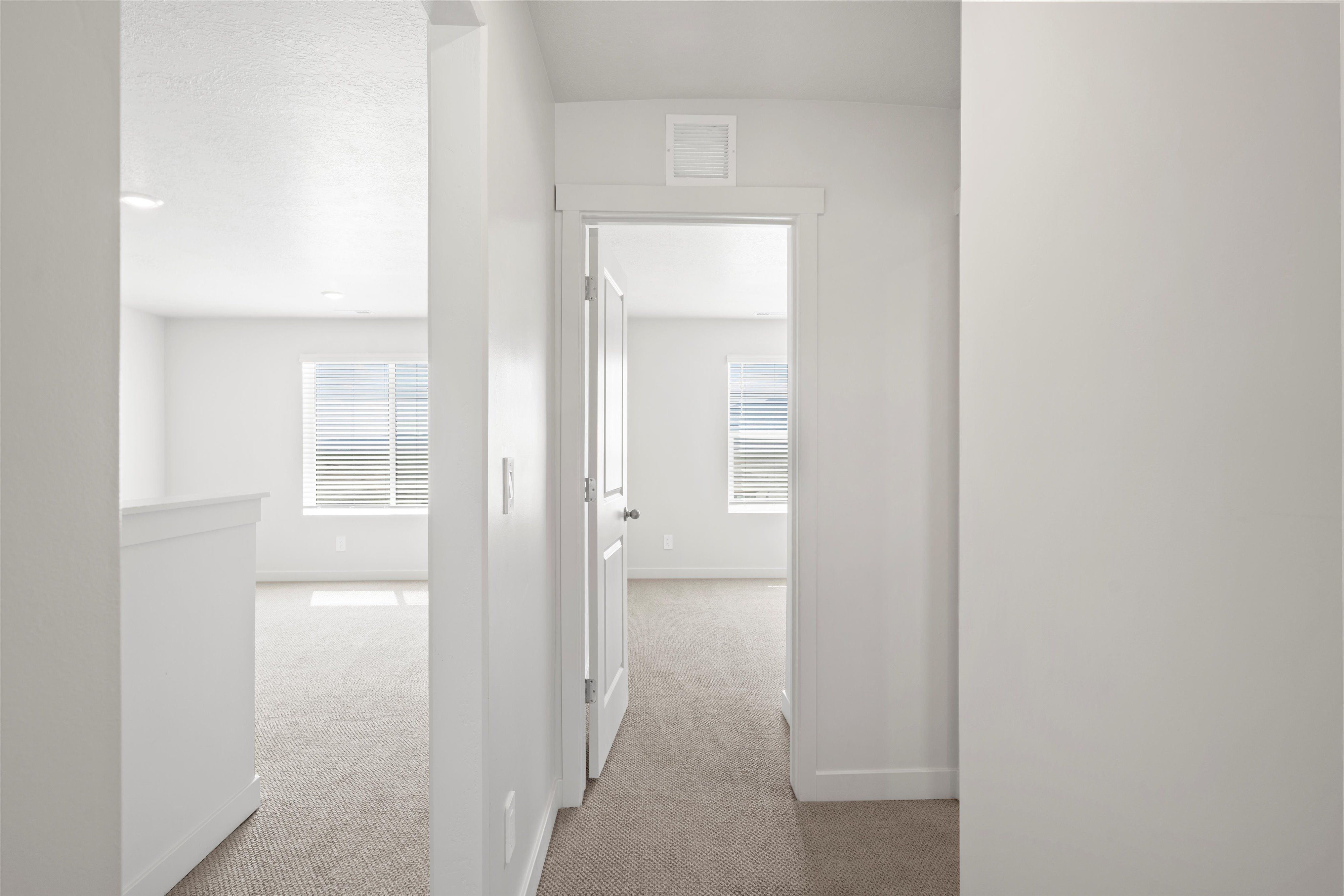 The Cottonwood floorplan interior image taken at a Meritage Homes Community in Eagle Mountain, UT.