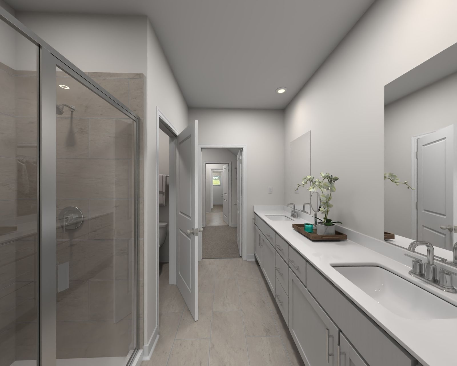 The primary bathroom offers dual vanity sinks and a walk-in shower.