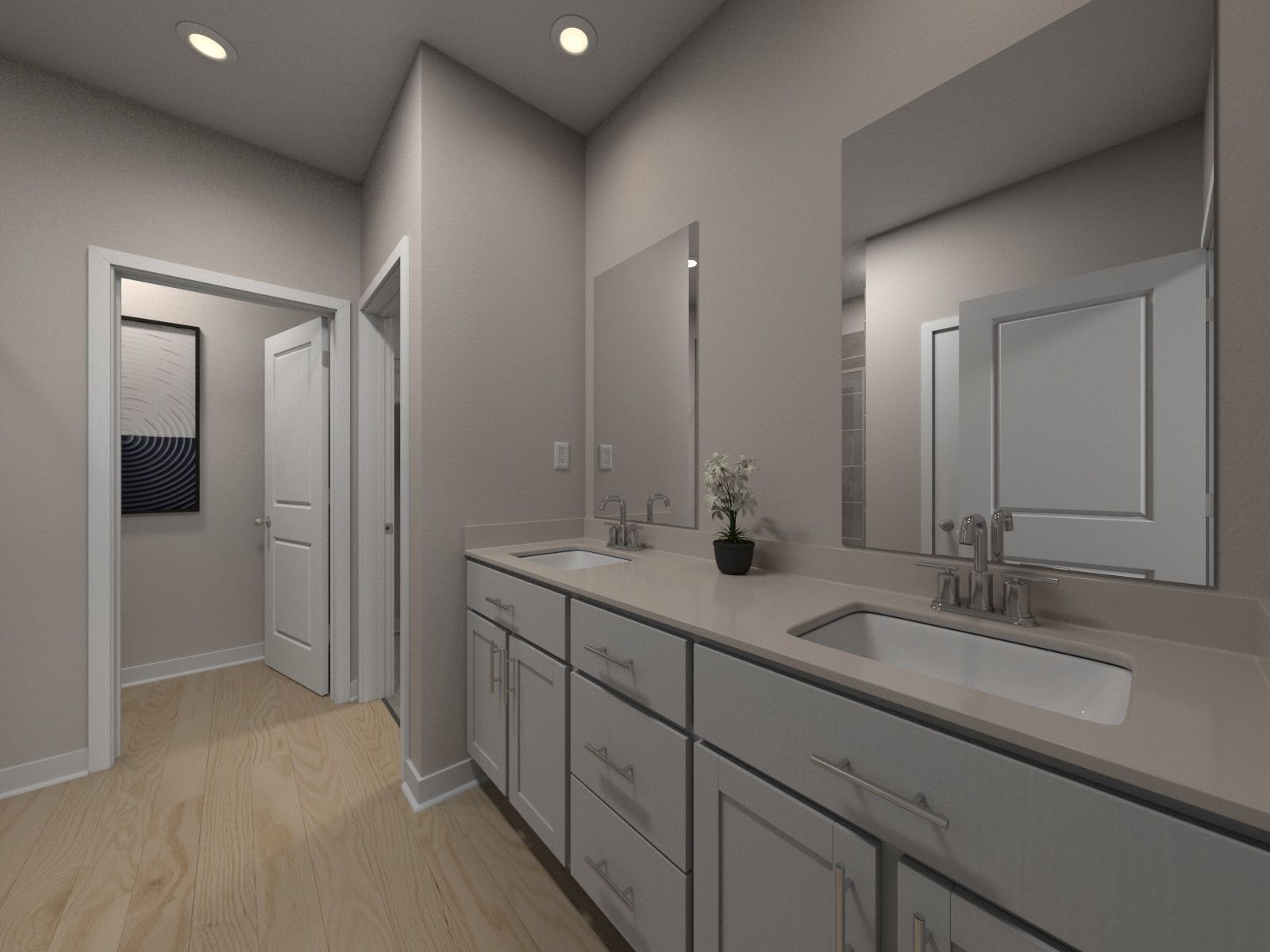 The primary bathroom offers dual vanity sinks and a walk-in closet.