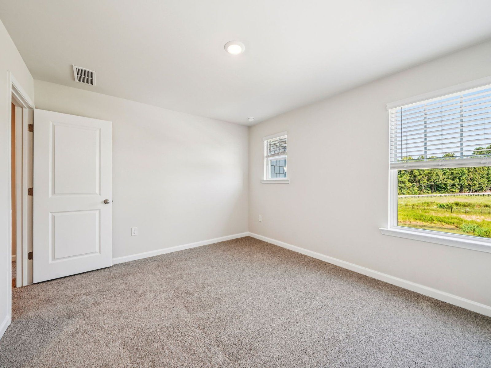 The Taylorsville floorplan with the Lush White interior package.