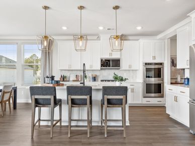 Enjoy a quick and easy breakfast at the barstool chairs.
