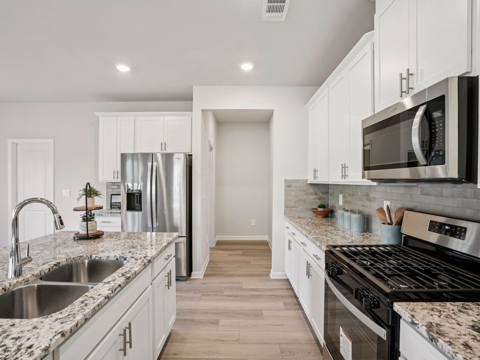 The Brentwood Basement floorplan with the Cozy Linen interior package.