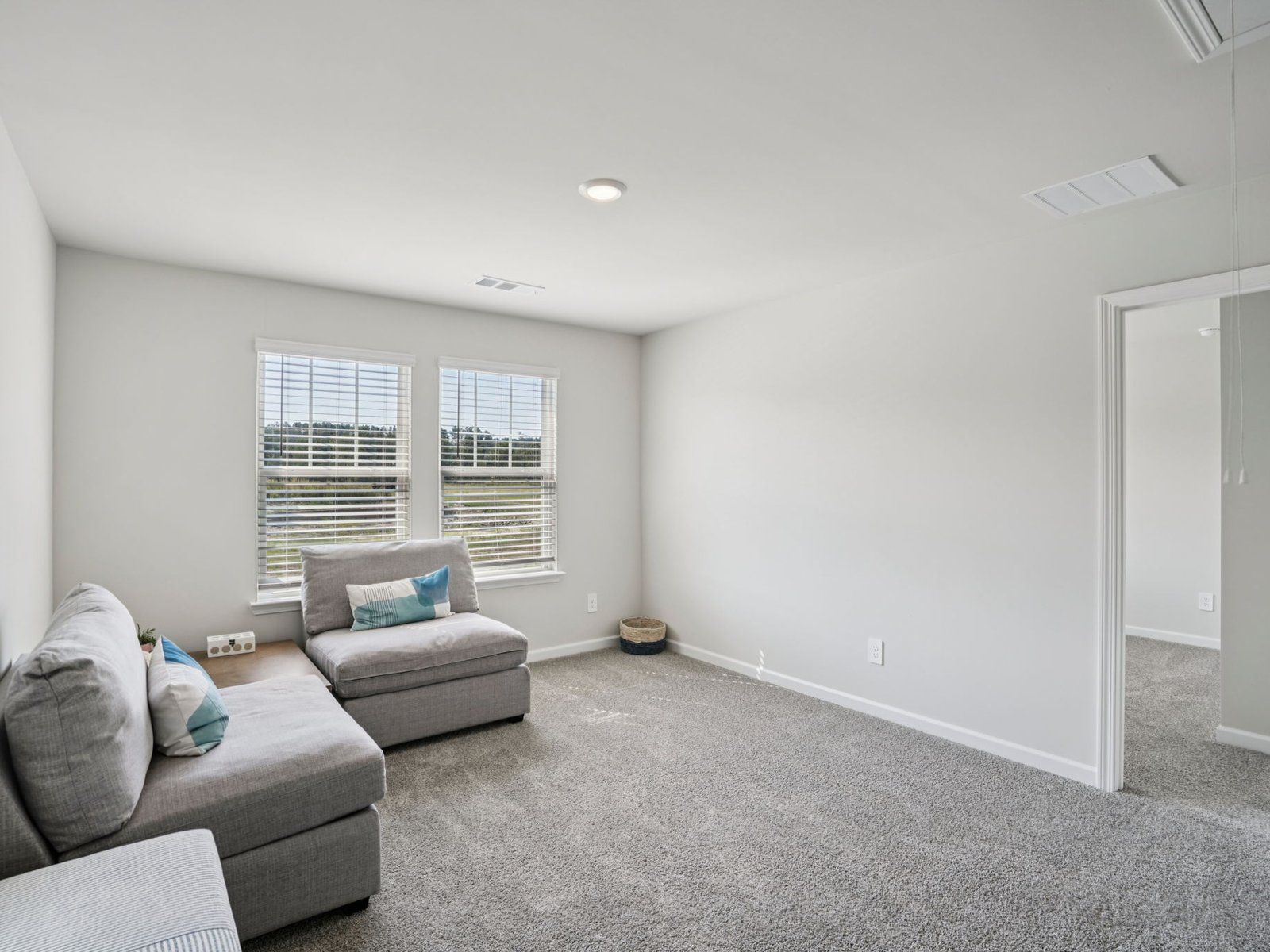 The Brentwood Basement floorplan with the Cozy Linen interior package.
