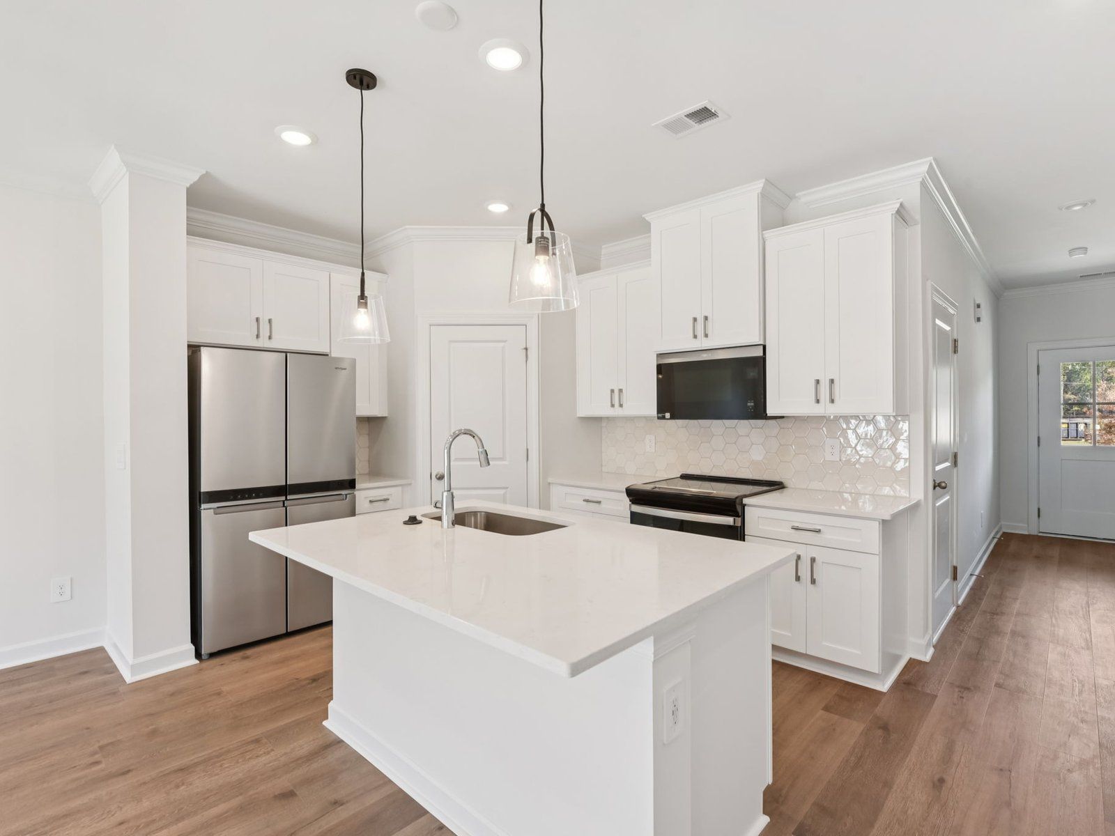 Cook your favorite meals in the sleek, modern kitchen.