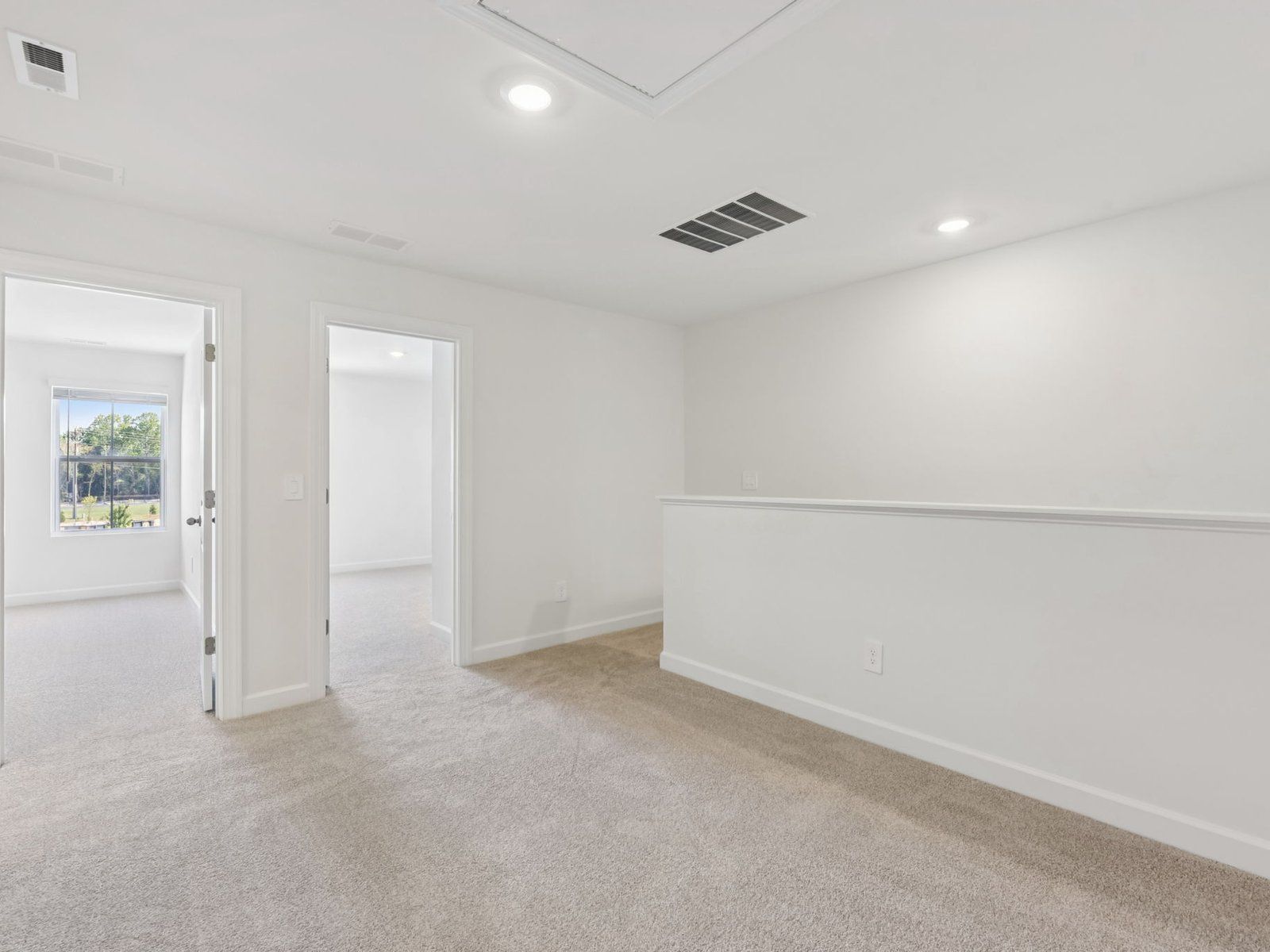 The upstairs loft conveniently leads to each bedroom.