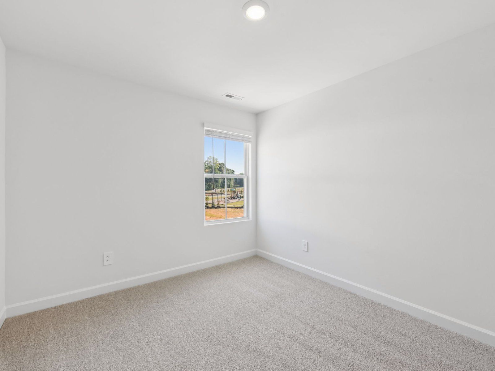 This secondary bedroom is perfect for your work-from-home office.