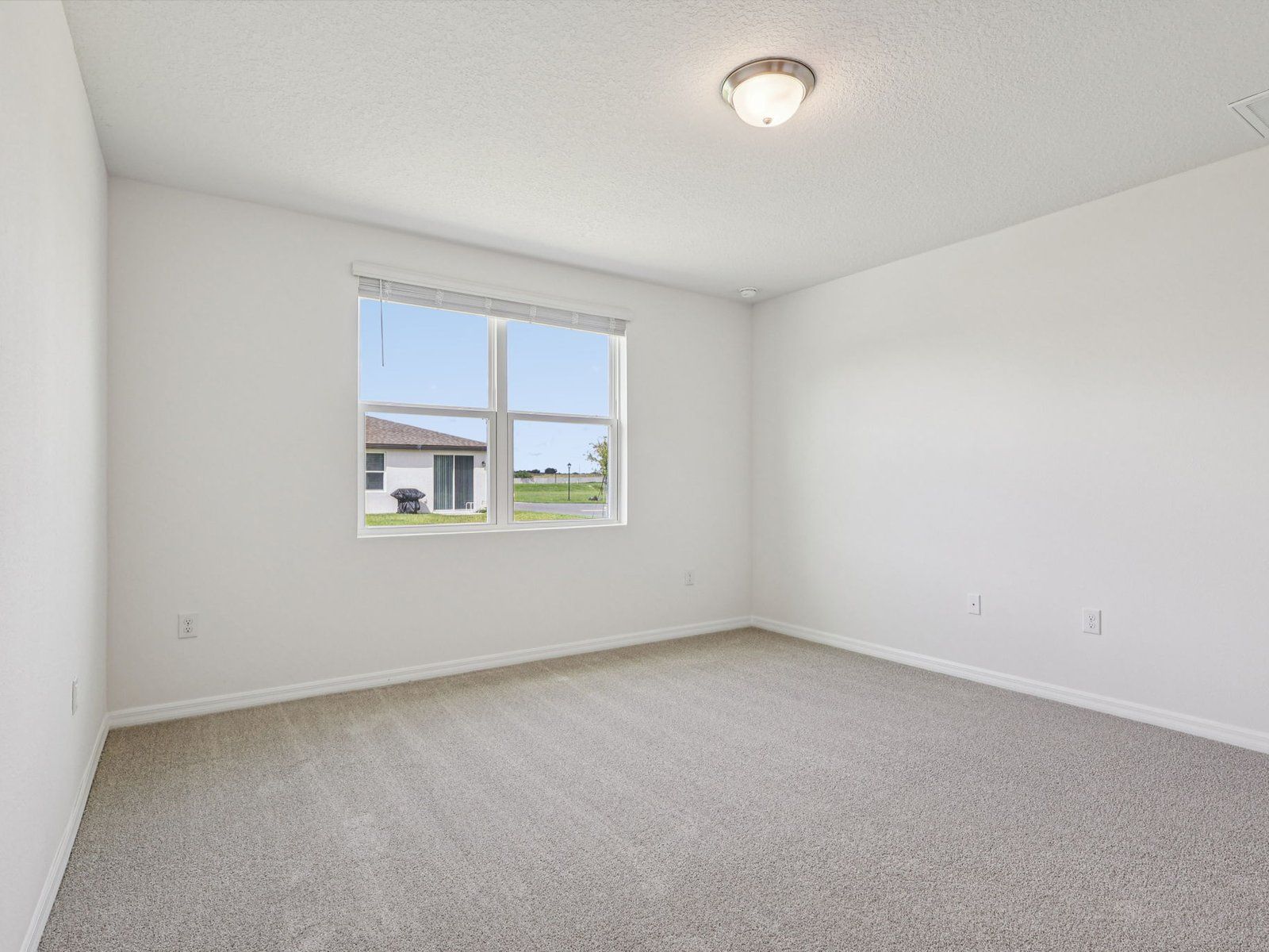 The Primary Bedroom of the Hibiscus Floorplan.