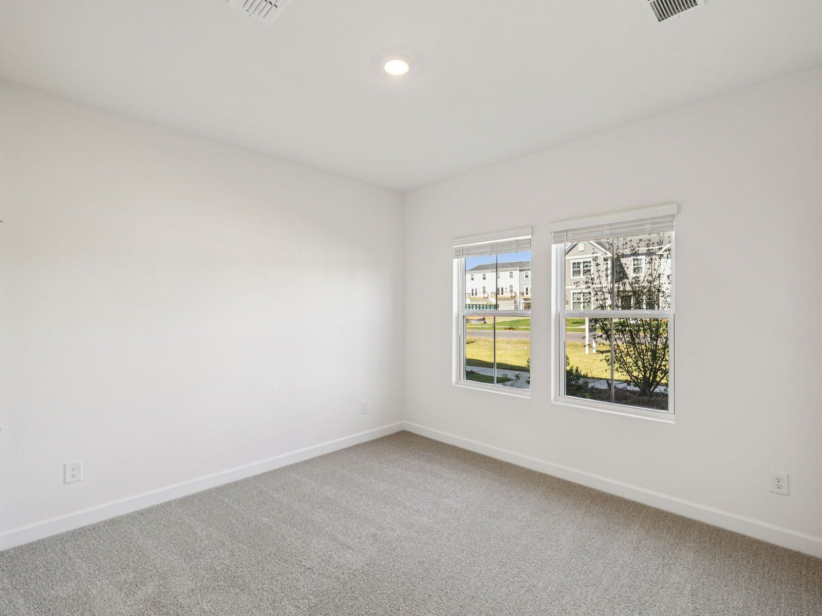 The Farmington floorplan includes three secondary bedrooms.