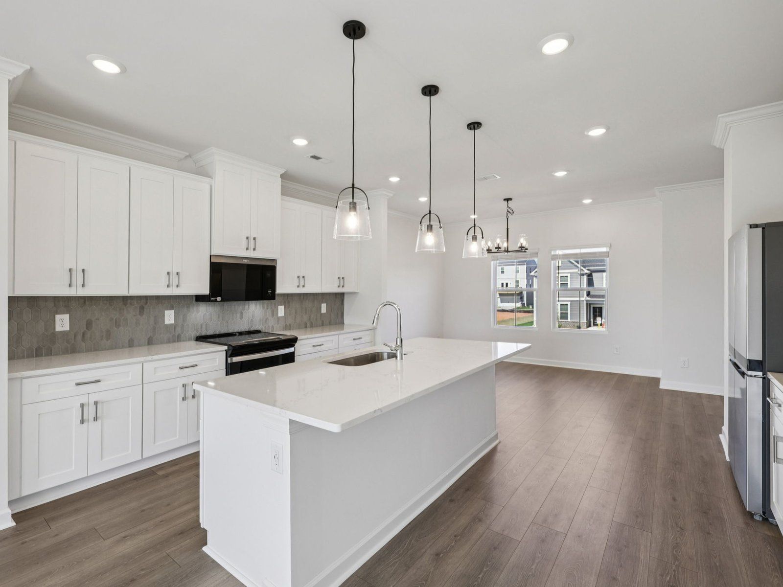 Enjoy the spacious kitchen with modern design features.