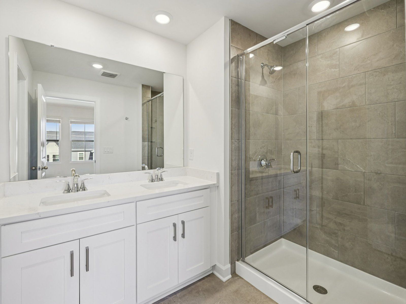 House all your self-care essentials in the primary bathroom for a spa-like experience.