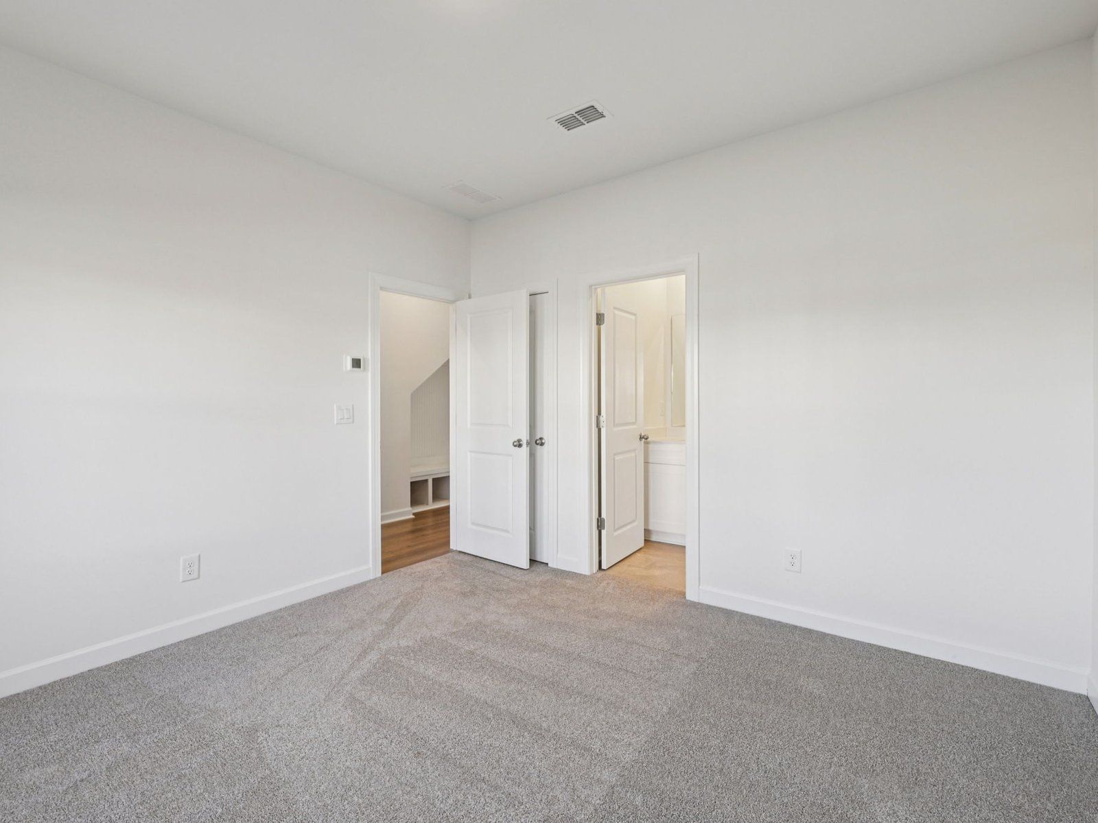 The downstairs secondary bedroom is perfect for guests.