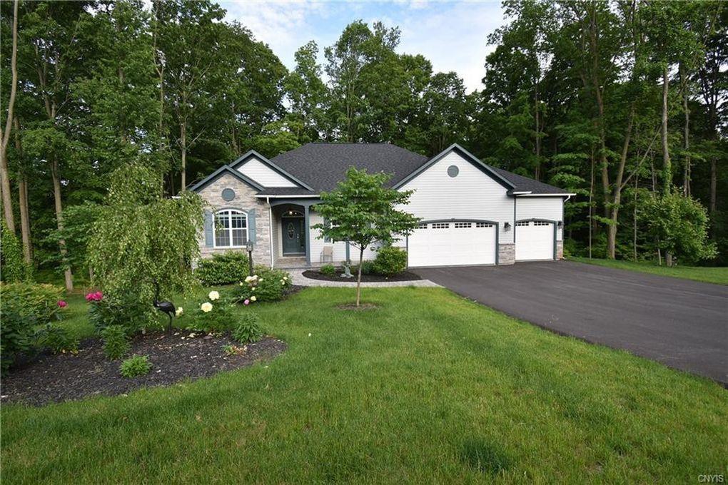 casa en Springwoods por Merle Builders