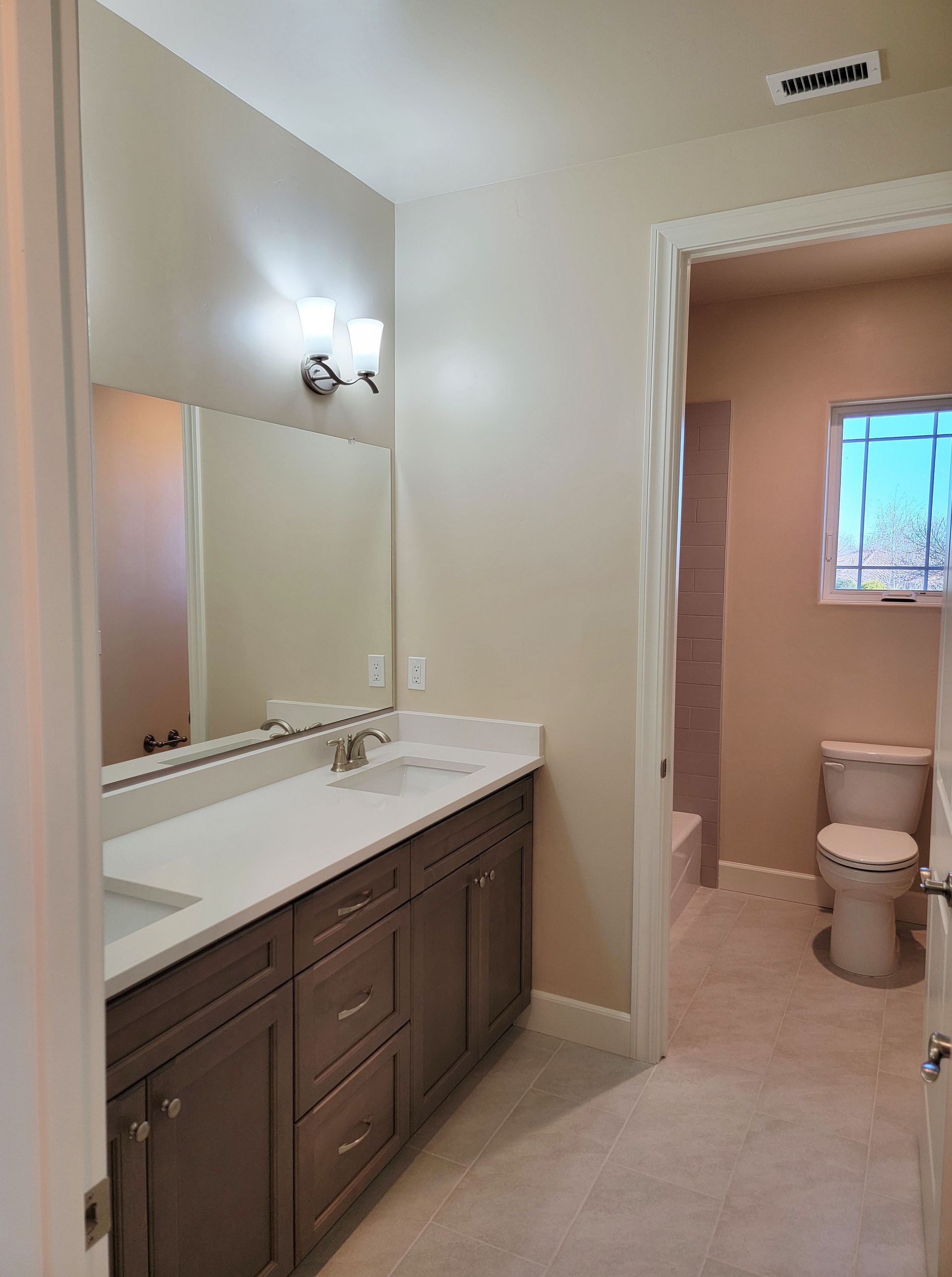 Photo shows different floor plan from same community