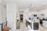 Koenig Townhomes por Milestone Community Builders en Austin Texas