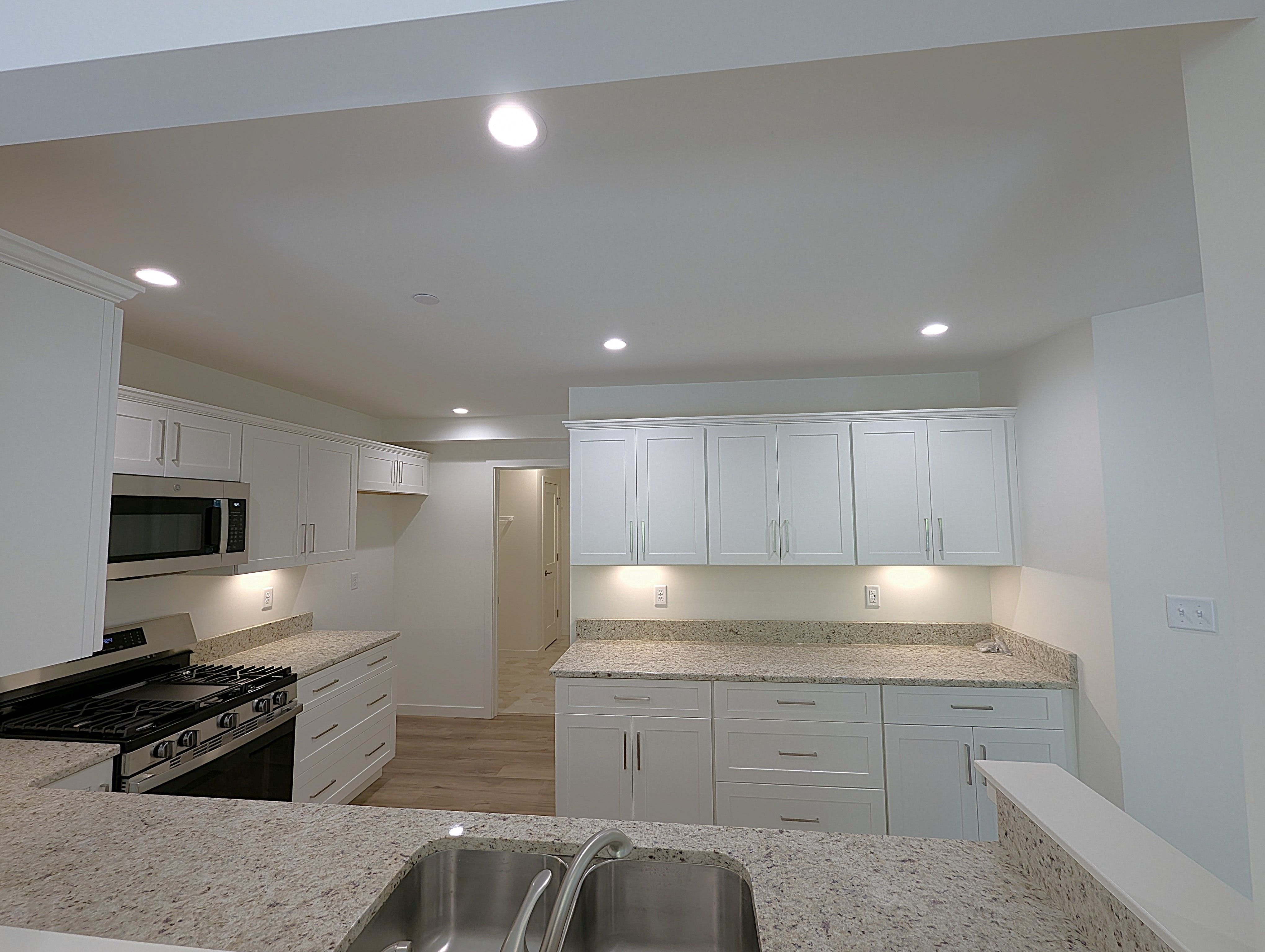 Lots of cabinets, soft-close cabinets, granite top, pantry closet