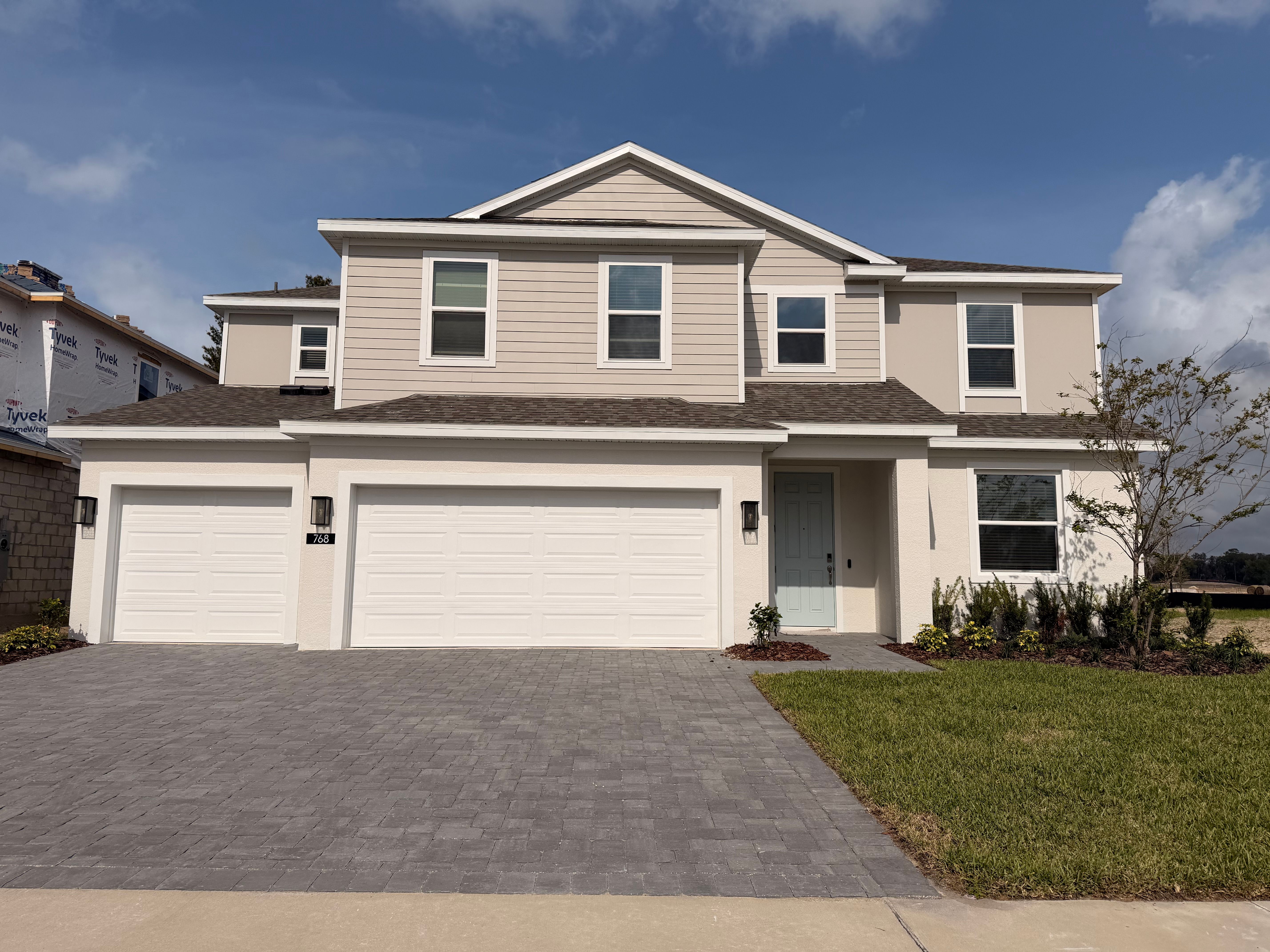Trinity Gardens por Risewell Homes en Daytona Beach Florida