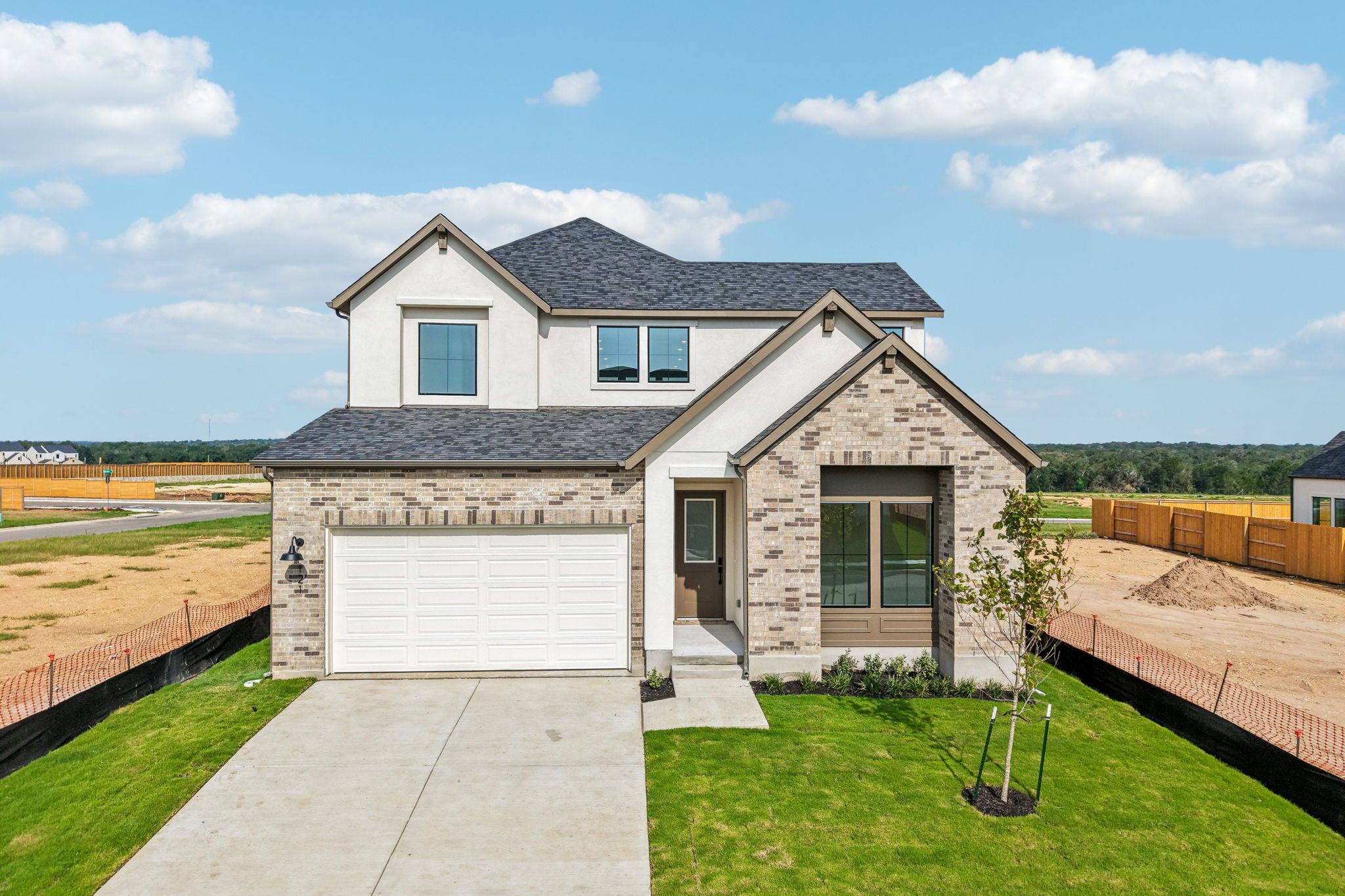 Manors Collection - Freedom at Anthem por Risewell Homes en Austin Texas