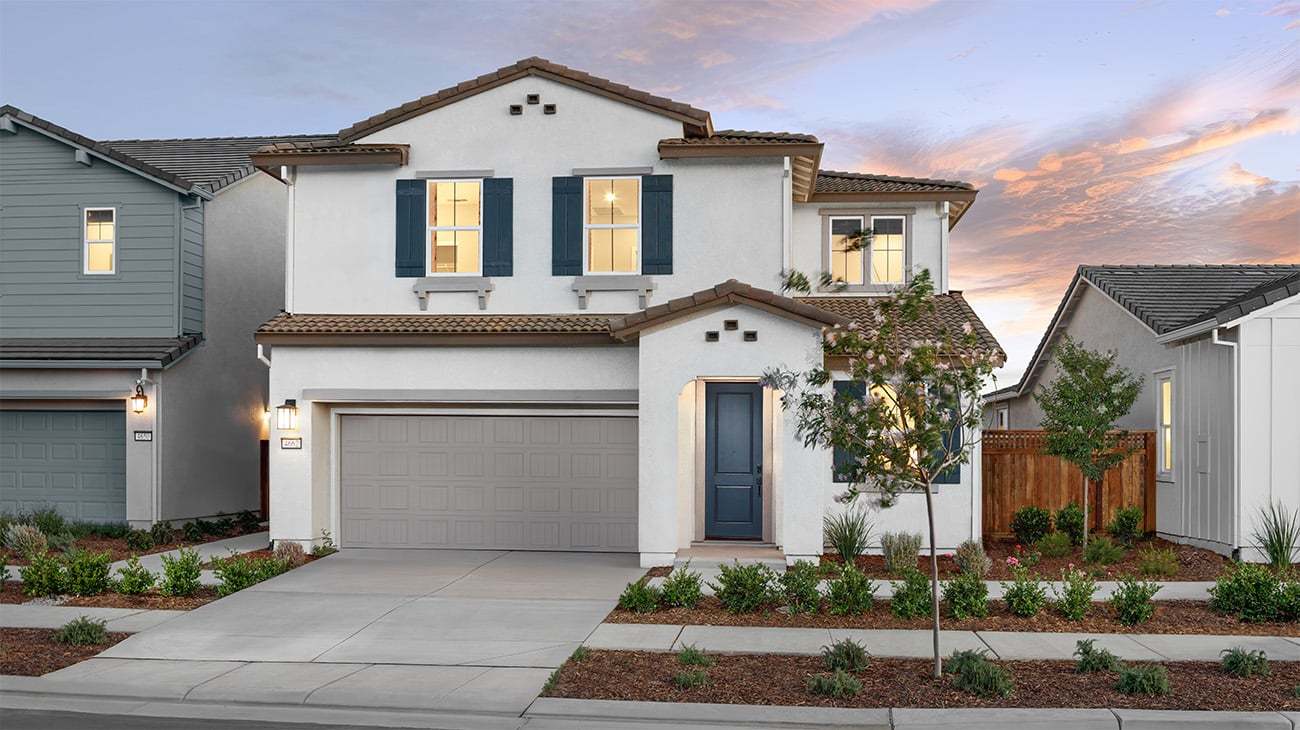 Model Photography of Bridgeway's Plan 3502 with an Edited Driveway
