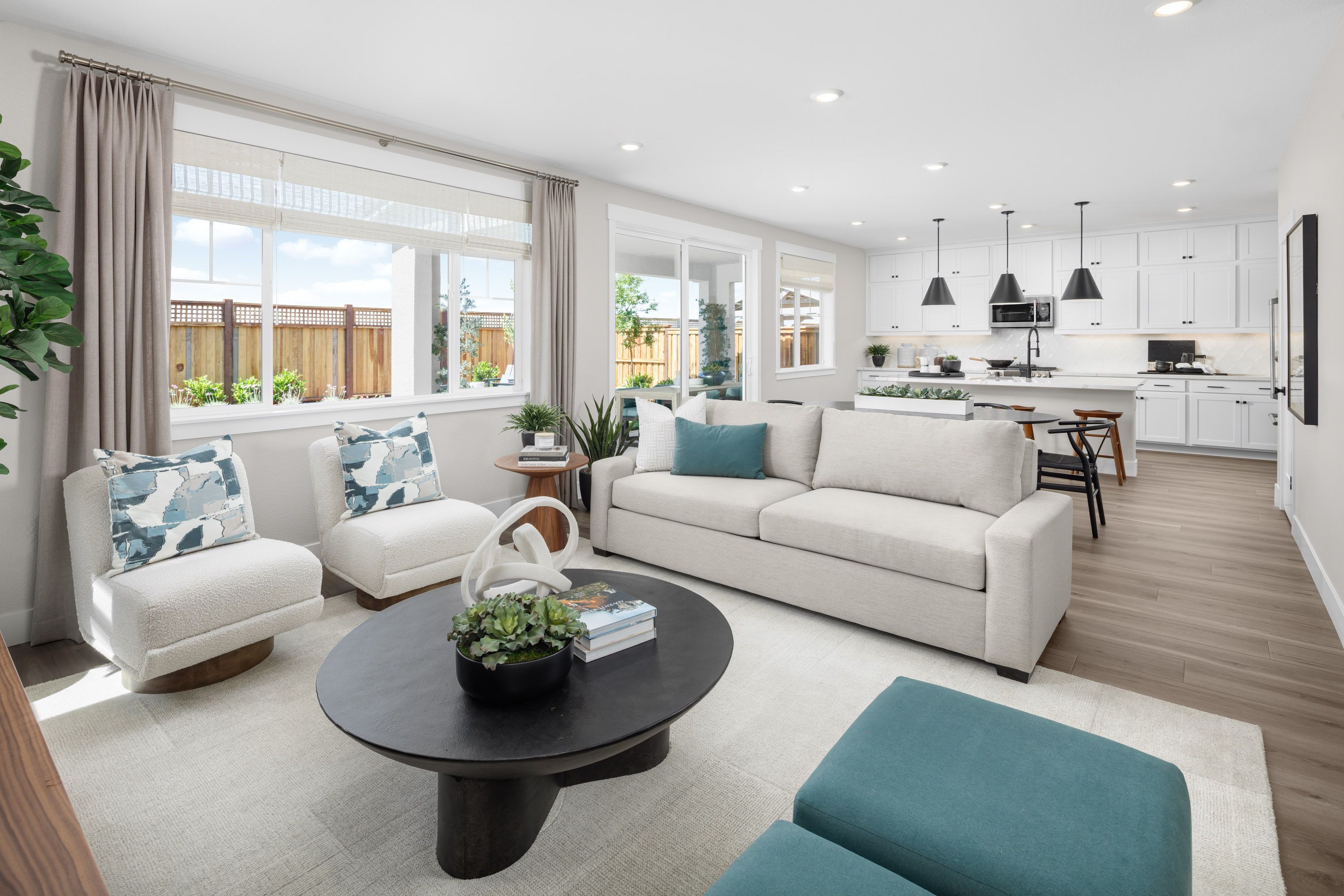 Great room interior at Plan 3503 at Bridgeway at River Islands.