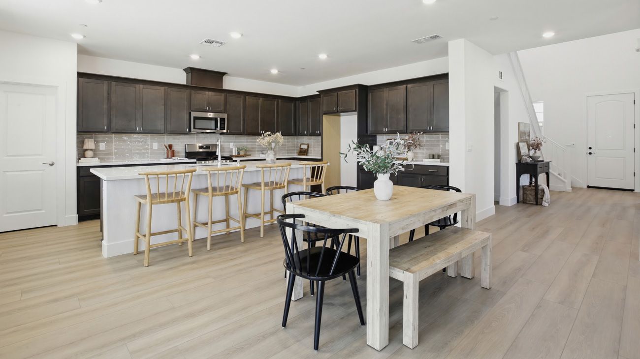 Kitchen and Dining at Plan 5002, The Residences at Arbor Ranch