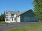 casa en Northwoods Custom Builders, Inc. por Northwoods Custom Builders, Inc.