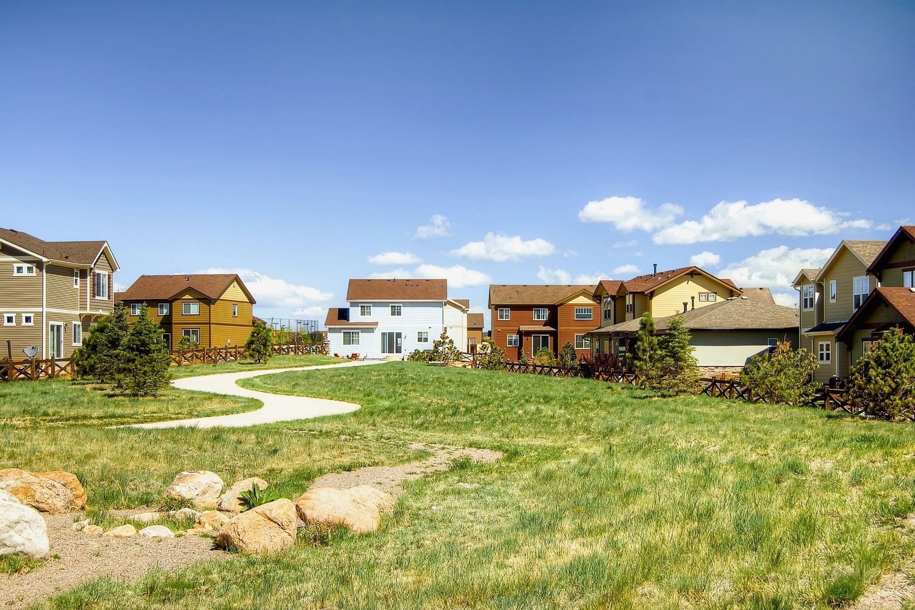 A view of homes and a walking trail.