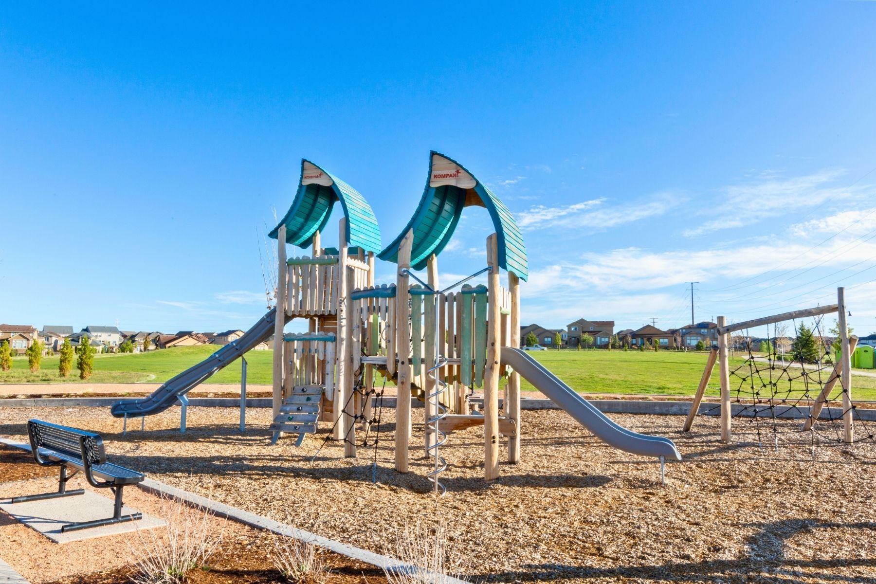 One of many neighborhood parks with ample play spaces for all ages.