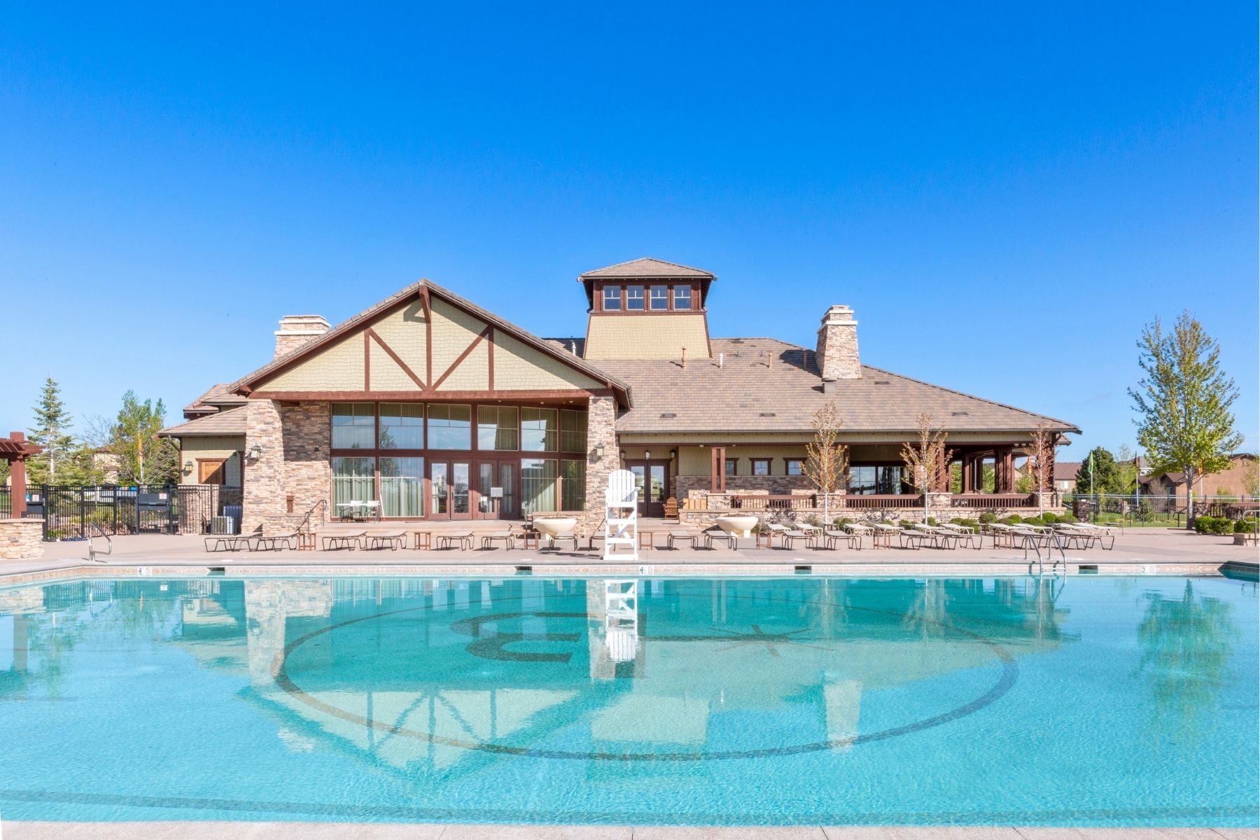 A view of the Ranch House from across the pool.