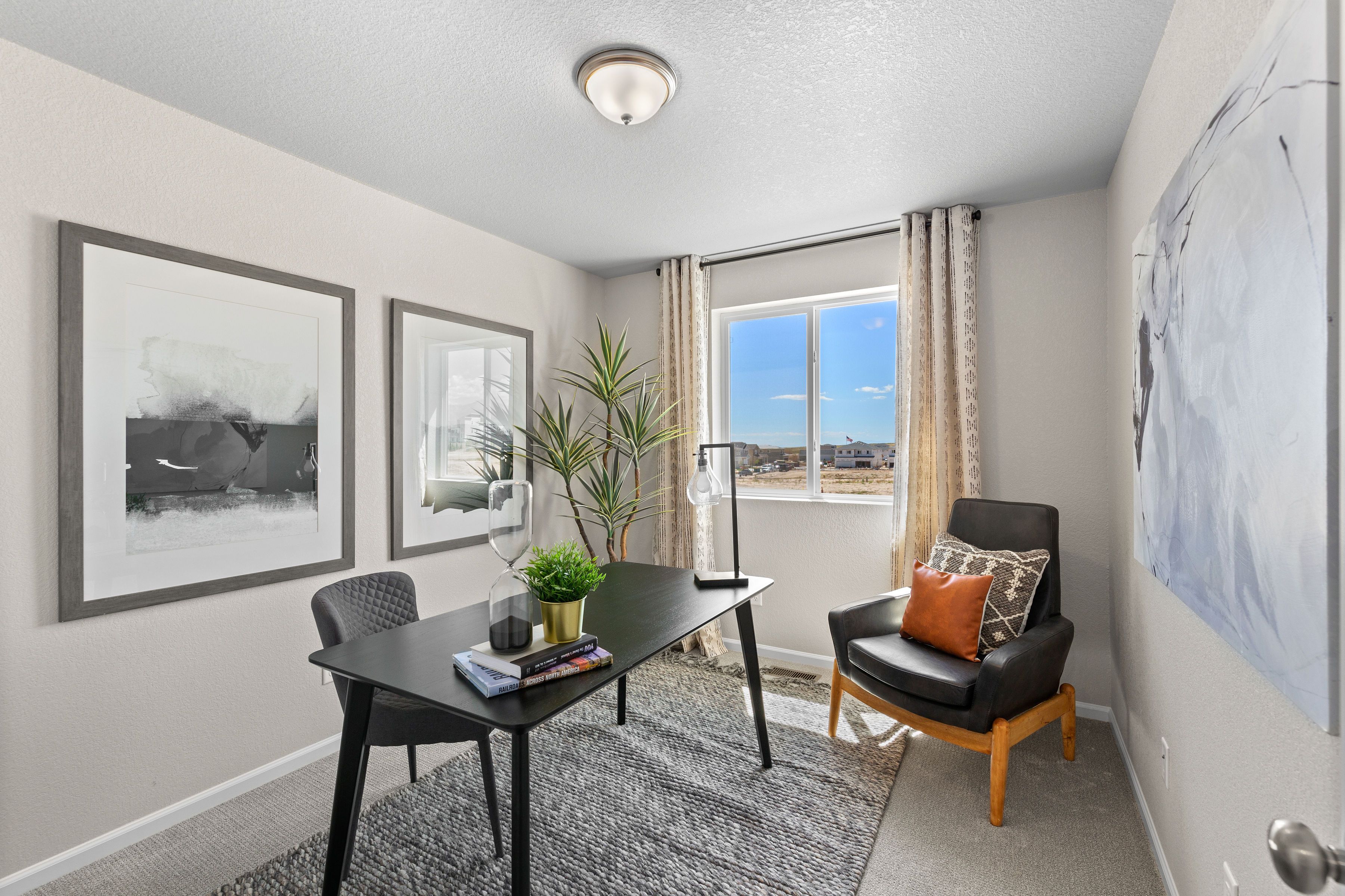 A view of the 3rd bedroom/office area