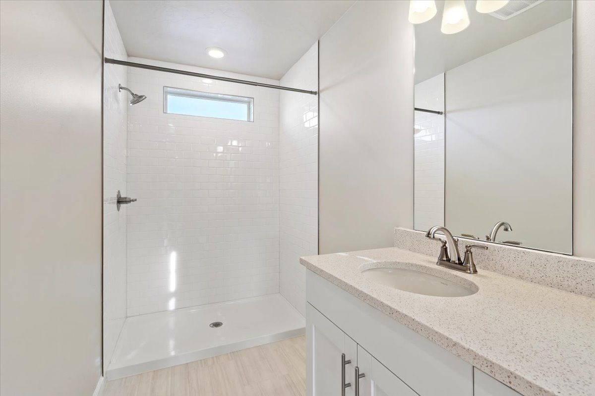 A view of the Secondary bathroom and vanity