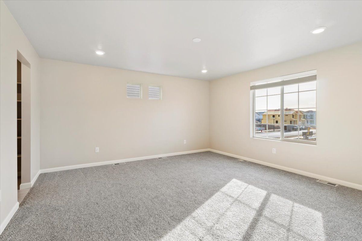 A view of the Primary Bedroom and Windows
