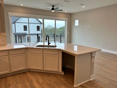 Great plan for entertaining family and friends. Large sliding glass doors that lead you to the deck