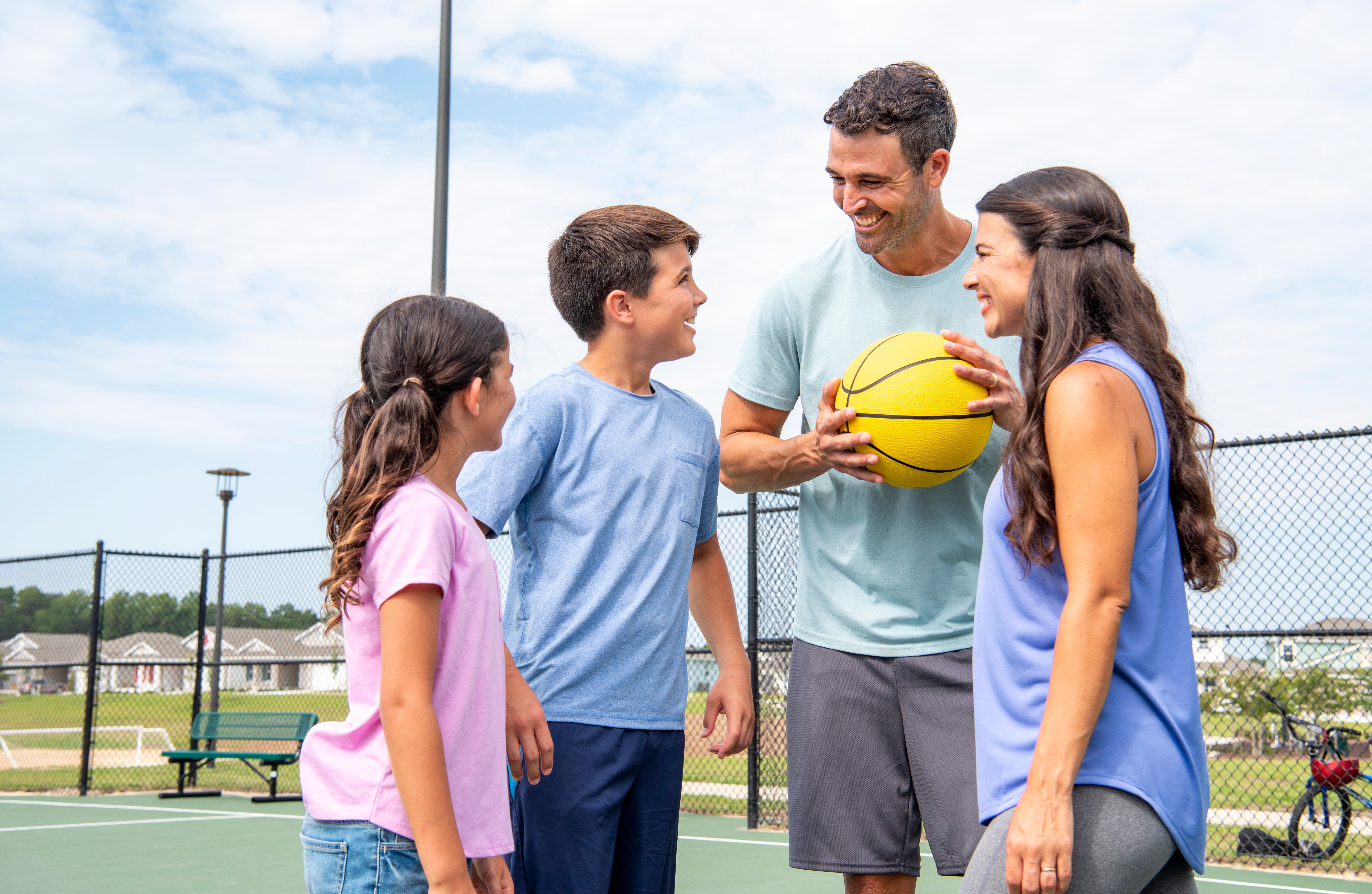 Calesa Township residents can enjoy full court basketball at the private community center!
