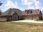 casa en Owasso Custom Homes por Owasso Custom Homes