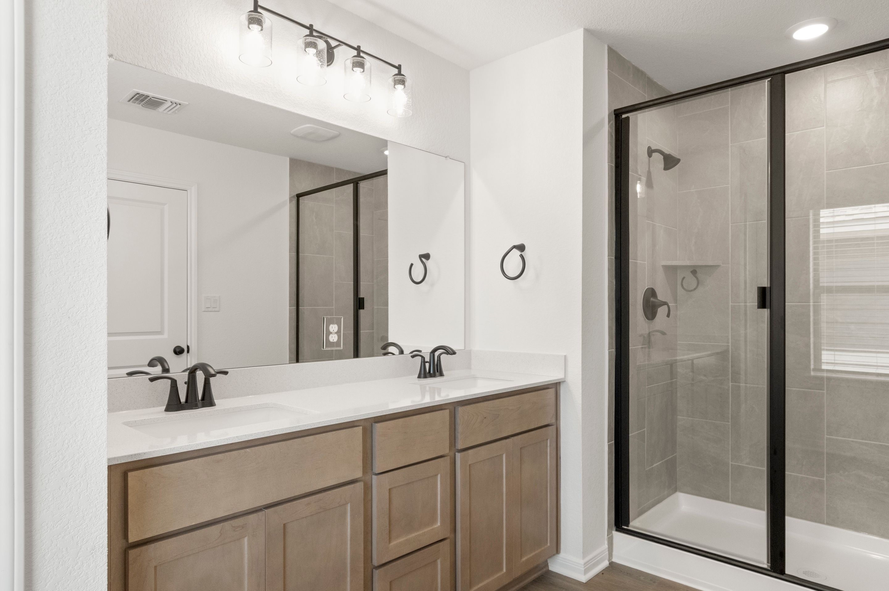 27_UpstairsPrimaryBathroom2
