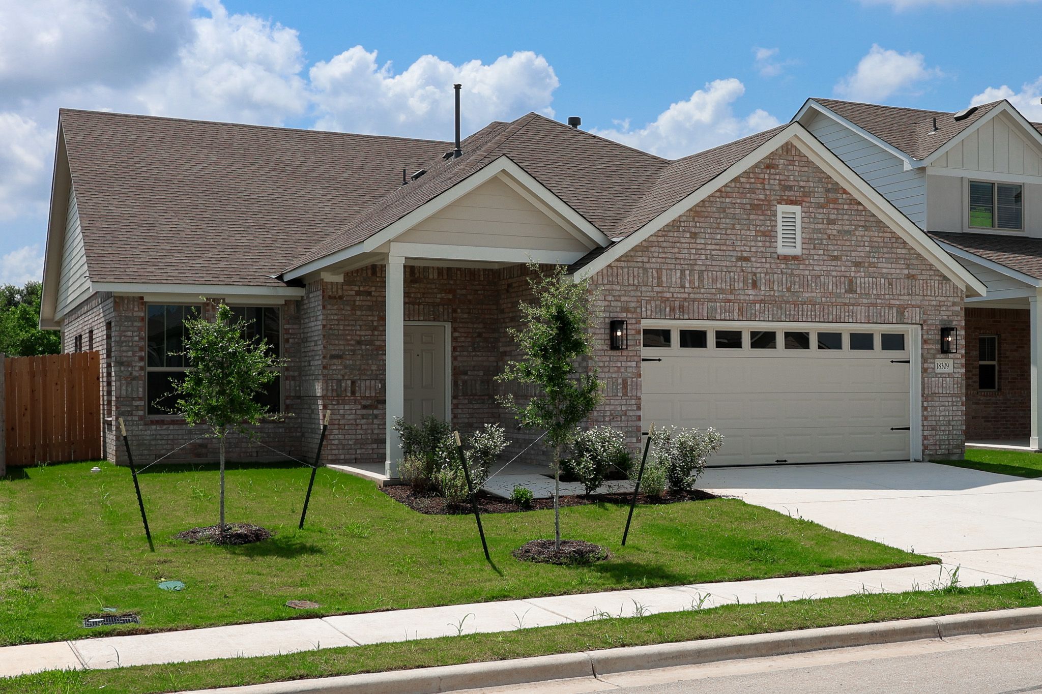 Village at Manor Commons por Pacesetter Homes Texas en Austin Texas