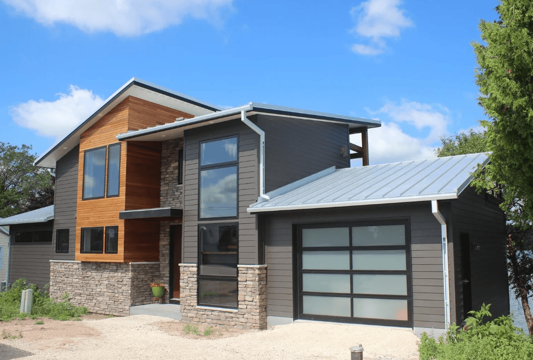 casa en Pekarske Builders por Pekarske Builders Inc.