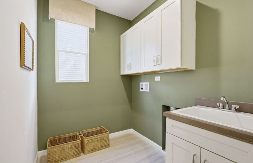 Laundry Room with Utility Sink and Shelving