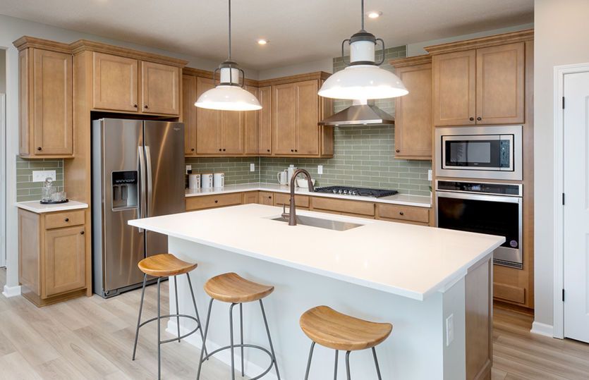Kitchen with Large Island and Recessed Can Lighting