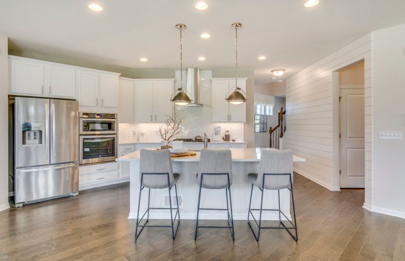 Kitchen with Stainless Steel Appliances and White Cabinets