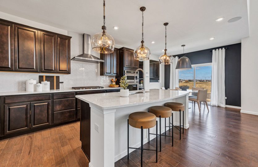 Kitchen with Pendant Lighting and Stainless Steel Appliances