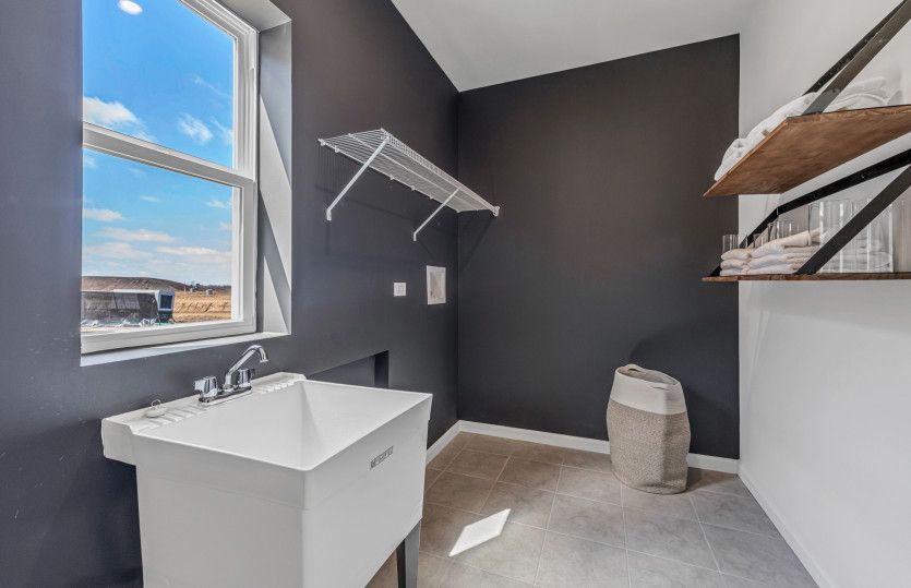 Laundry Room with Utility Sink and Shelving