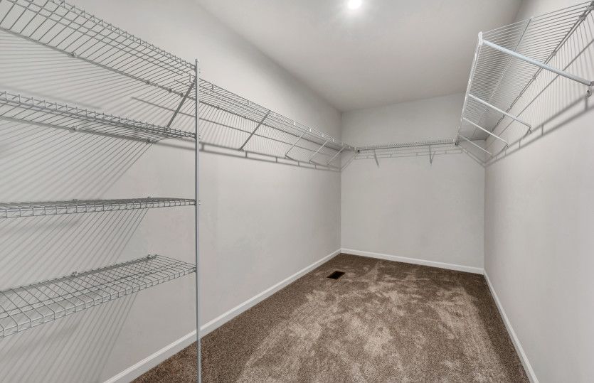 Owner's Suite Walk-in Closet with Shelving